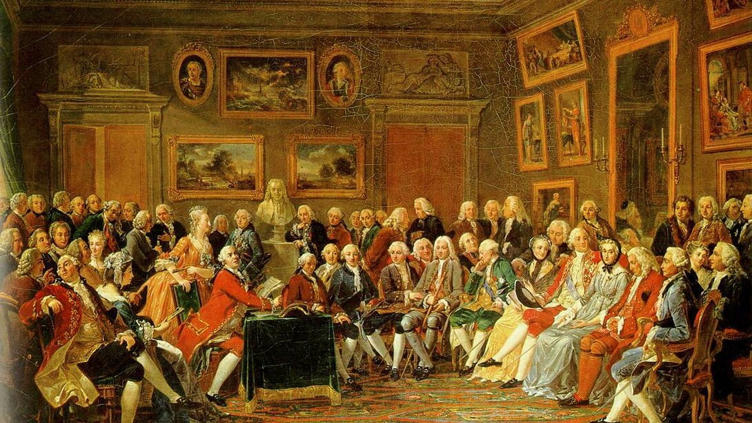 Lectura de la tragedia «El huérfano de la China», de Voltaire, en el salón de madame Geoffrin en 1755 (1812), autor: Lemonnier. Este cuadro fue un encargo de la emperatriz Josefina. Entre los asistentes, en presencia de un busto de Voltaire, exiliado en el momento en que se desarrolla la escena, están entre otros Montesquieu, Rousseau y otros numerosos enciclopedistas y pensadores de la Ilustración francesa