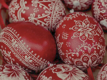 Red colored eggs resemble blood, which brings life and ensures salvation