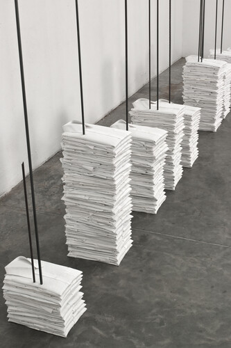 Doris Salcedo, Untitled (camisas), 2013, Cloth shirts, metal rebars, and plaster in 11 parts. Photo: Oscar Monsalve Pino. Courtesy Alexander and Bonin, New York