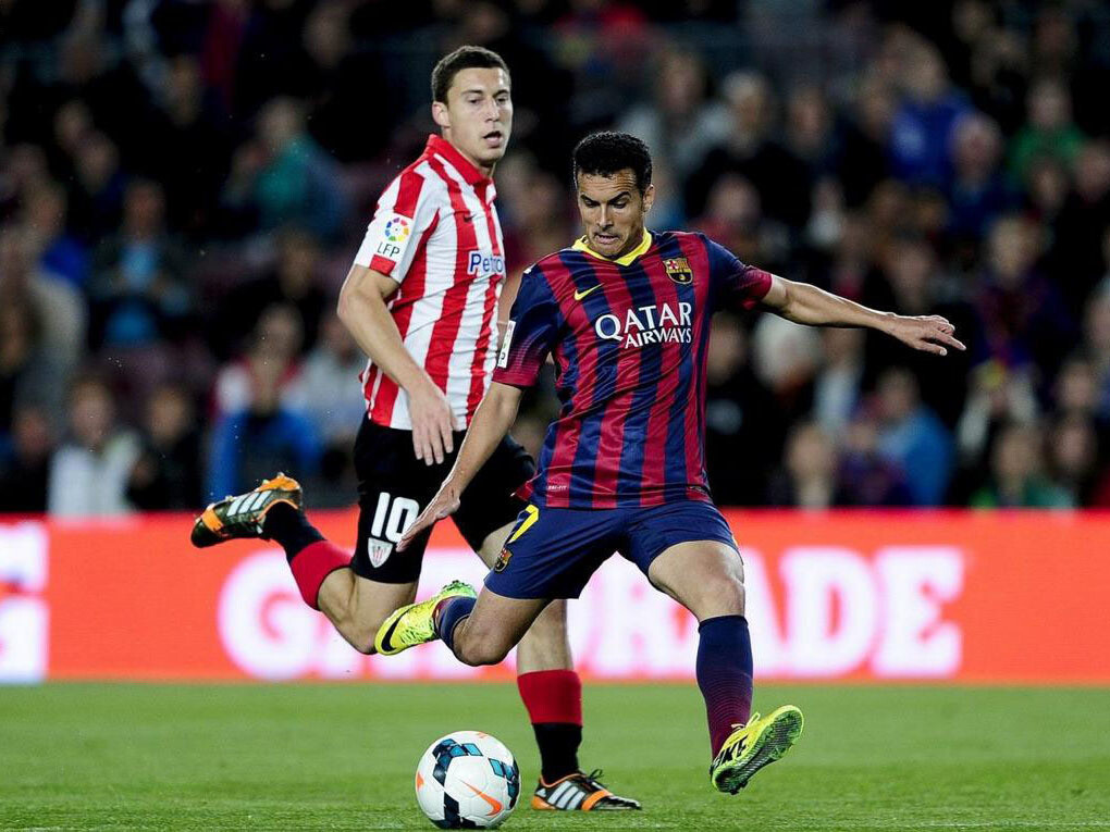 Pedro (FC Barcelona) y Óscar de Marcos (Athletic) durante el último partido de ambos equipos en el Camp Nou