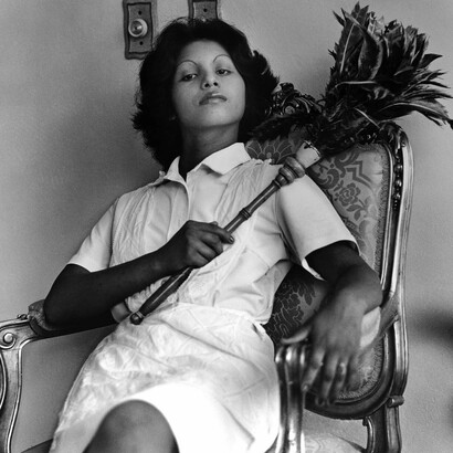 Sandra Eleta (Panamanian, b. 1942), Edita (la del plumero), Panamá (Edita [the one with the feather duster], Panama), 1977, from the series La servidumbre (Servitude), 1978-79. Black-and-white photograph. 19 × 19 in. (48.3 × 48.3 cm). © Sandra Eleta. Courtesy of Galería Arteconsult S.A., Panama.