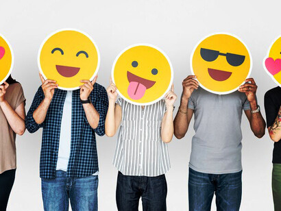 People express happiness with smileys, reflecting the integral role of technology in modern communication and fostering positive connections
