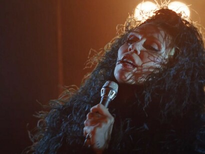 Miley Cyrus in a scene from the music video for Something Beautiful, reflecting the album’s intimate and cinematic aesthetic