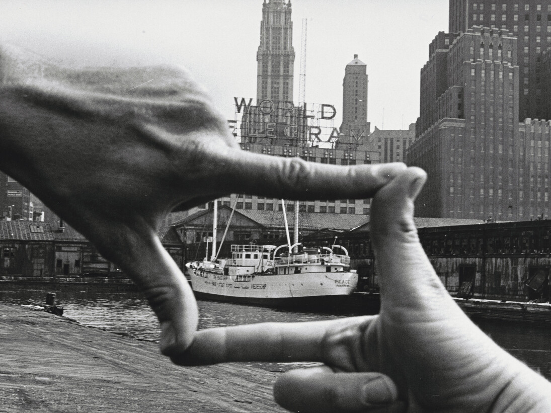 John Baldessari (American, born 1931). Hands Framing New York Harbor from Pier 18. 1971. Photograph by Shunk-Kender (Harry Shunk [German, 1924-2006] and János Kender [Hungarian, 1937-1983]). Gelatin silver print, 7 3/8 × 9 15/16″ (18.8 × 25.2 cm). The Museum of Modern Art, New York. Gift of the Roy Lichtenstein Foundation in honor of Jennifer Winkworth and Kynaston McShine and in memory of Harry Shunk and János Kender. © 2014 John Baldessari. Photograph: Shunk-Kender © J. Paul Getty Trust. The Getty Research Institute, Los Angeles