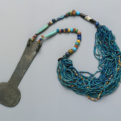 Period:New Kingdom
Dynasty:Dynasty 18
Reign:reign of Amenhotep III
Date:ca. 1390–1353 B.C.
Geography:From Egypt, Upper Egypt, Thebes, Malqata, Birket Habu Mound B 1, Private House B, MMA excavations, 1911–12
Medium:Faience, bronze or copper alloy, glass, agate, carnelian, lapis lazuli, turquoise
Dimensions:L. of counterpoise 14.7 cm (5 13/16 in.)
Credit Line:Rogers Fund, 1911