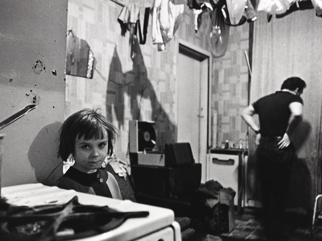 Mr and Mrs Gallagher lived with their 4 children in a ground floor tenement flat. Their bedroom was covered in pools of rainwater. At night they sleep with the light on to keep the rats away. One night they counted 16 rats in the room. Glasgow Maryhill, October 1970 © Nick Hedges / National Media Museum, Bradford