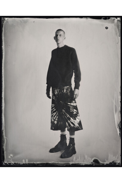 Kasia Wozniak, Wet plate collodion Ambrotype, Inspiration from the pages of Sherlock Holmes: “Don't you remember the amateur who fought three rounds with you …?” [The Sign of the Four by Arthur Conan Doyle] “Next he drew forth a pair of boots.” [The Valley of Fear by Arthur Conan Doyle], Fashion credits: Jumper: boxing instructor (archive); Trousers: Craig Green; Boots: Dr. Martens, © Kasia Wozniak/Museum of London