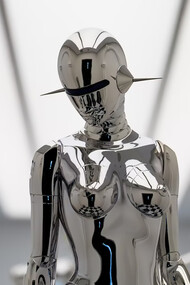 A sleek, futuristic silver robot embodying advanced technology and artificial intelligence