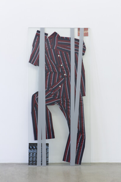 Lili Reynaud-Dewar, Vivre avec ça ?!, 2014, Pyjama d'homme, verre, ruban adhésif, radiographies dentaires, impressions laser / Man's pyjamas, glass, tape, dental radiographies, laser prints, 165 x 75 cm, Vue de l’exposition / Exhibition view « Vivre avec ça ?!», kamel mennour (47, rue saint-andré des arts), Paris, 2014, © Lili Reynaud-Dewar, © Photo. Fabrice Seixas, Courtesy the artist and kamel mennour, Paris