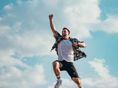 Man celebrating with a jump in the air