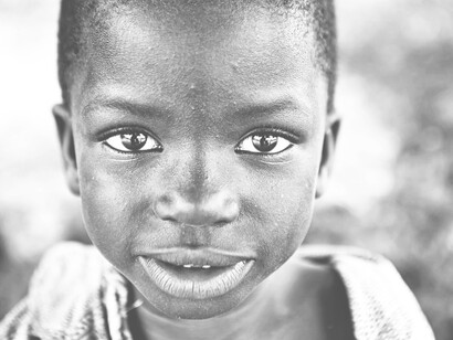 A Ugandan child: symbol of man's inhumanity to man