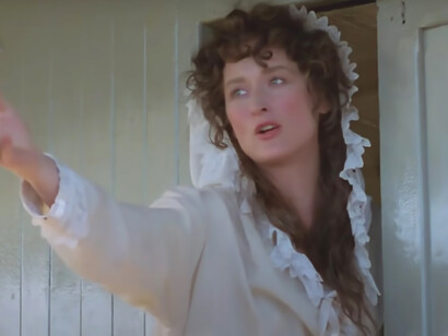 Meryl Streep radiates timeless elegance in her iconic white dress from 'Out of Africa,' a symbol of grace against the backdrop of Kenya's breathtaking landscapes