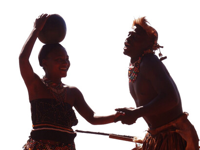 Through song and dance, a man and woman honour their heritage but also actively participate in the ongoing journey of keeping isiZulu alive and thriving in modern society