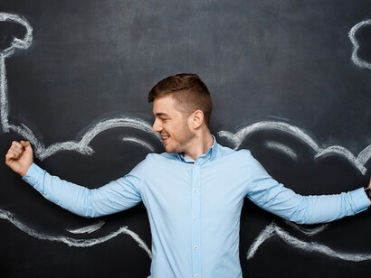 Visual of a man with artificial muscle arms, highlighting themes of goal setting, personal development, and achieving success