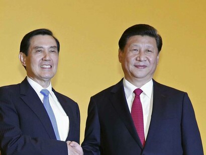Former president of China Ma Ying-jeou(left) in a handshake with President of China Xi Jinping