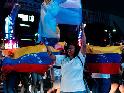 Buenos Aires, Argentina Venezuelan community celebrating in the streets with flags and joyful crowds