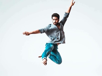 A man jumps high into the air