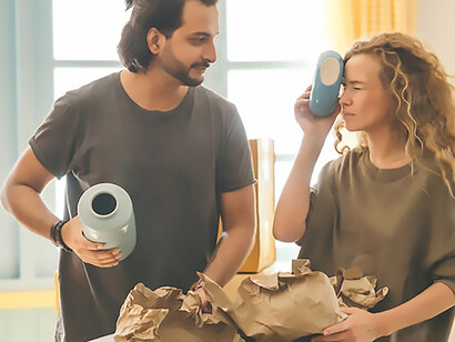 A couple is embarking on a new journey, methodically packing up their possessions as they prepare to move