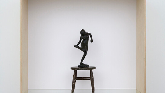 Haim Steinbach, dancer with raised right foot, 2011, Wood, plastic laminate and glass box; wood stool; painted bonded bronze Degas statuette, 52 x 56 x 25 5/8 inches; 132.1 x 142.2 x 65.1 cm. Collection Statens Museum fur Kunst, Copenhagen. Courtesy the artist and Tanya Bonakdar Gallery, New York