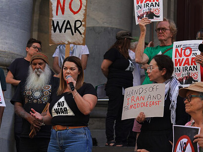 Protesters on the steps of Adelaide's Parliament House as part of the snap 'No War' rally, held to protest the Iran War and Australia's involvement in it. Sarah Hanson-Young, a federal senator for the Australian Greens, is speaking in the middle
