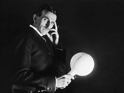 Nikola Tesla holding a wireless illuminated globe. This photograph was advertised for sale for $1 in the February 1919 issue of Electrical Experimenter
