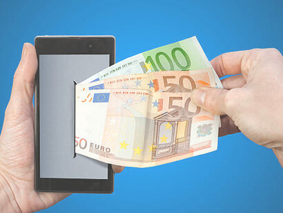 A digital euro streams out of a smartphone, illustrating the next generation of financial transactions