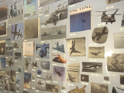 Fiona Banner, All the World’s Fighter Planes, 2009, Found newspaper clippings, labels, vitrine. -® and courtesy the artist 
