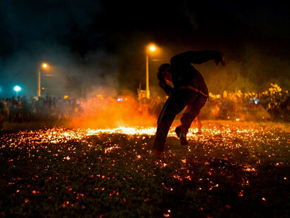 In the flicker of fire, echoes the call to align human consciousness with the universal essence, transcending conflicts and embracing unity