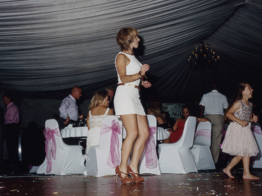 Woman dancing, Tara & Vito’s Wedding, Bedford, UK, 2013, © Lucy Levene, image courtesy of Flowers Gallery, London and New York 