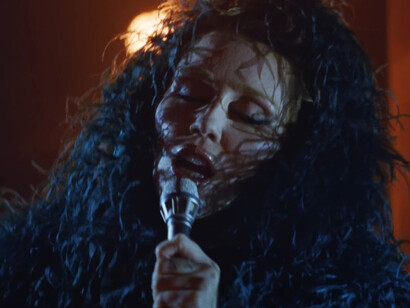 Miley Cyrus appears in the Something Beautiful music video, embodying the themes of transformation and vulnerability