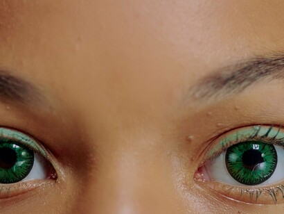 Person with green eyes looking at the camera