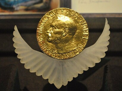 A timeless emblem of the world’s most prestigious peace award: the Nobel Peace Prize given to Rigoberta Menchú