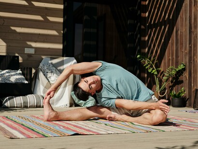 A yoga balance held with precision, representing the connection between resilience, awareness, and physical control