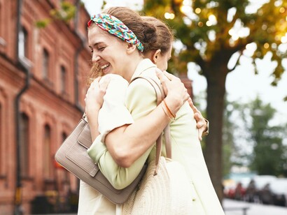 A hug from one friend to another to give thanks and appreciation