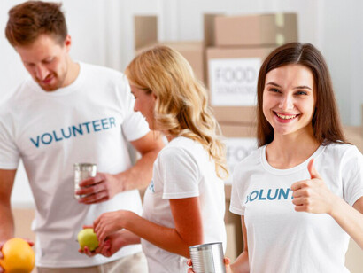 Dedicated volunteers work together to assemble and prepare boxes for charity contributions