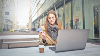 A shopper excitedly discovers the endless possibilities of today's digital marketplace, where nearly anything is within reach with just a few clicks