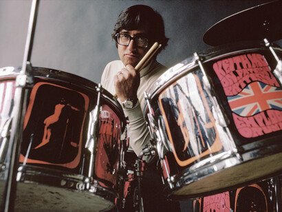 Art Kane sitting at Who's Keith Moon's drums 