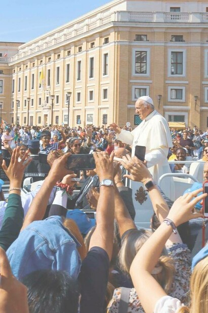 Pope Francis speaks to the crowd in Vatican city