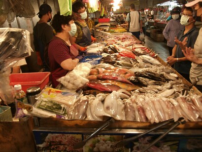 A stall with squid and fish, representing the abundance of produce that can be obtained from pure waters such as those surrounding most untouched Philippine islands