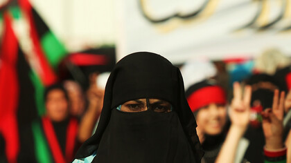 Libyan girl wearing a niqab during the demonstrations against the regime of Gaddafi in Bayda, Libya