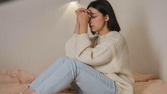 Woman asking the universe for help