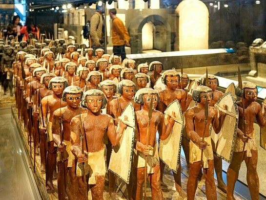 Wooden model soldiers from the tomb of Mesehti in Asyut, displayed at the Grand Egyptian Museum in Egypt