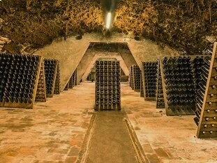 Deep beneath Esslingen, centuries of sparkling tradition quietly age in the dark