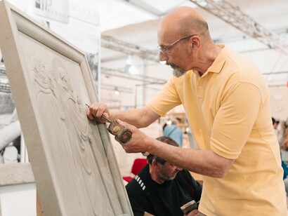Artigiani al lavoro alla Mostra internazionale dell'artigianato, Firenze, Italia. Foto di Mida90