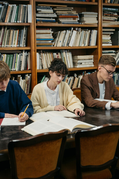 A group of students studying together in the library