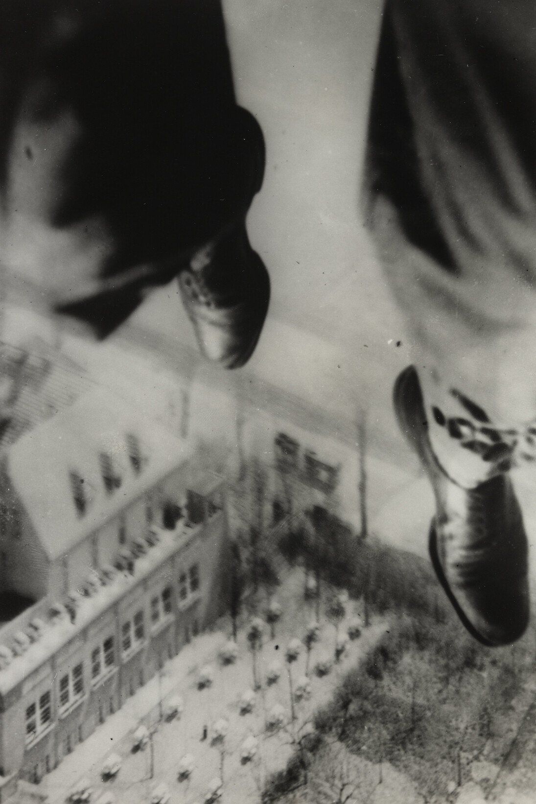 Willi Ruge (German, 1882-1961). Seconds before Landing from the series I Photograph Myself during a Parachute Jump. 1931. Gelatin silver print. 8 1/16 × 5 9/16″ (20.4 × 14.1 cm). The Museum of Modern Art, New York. Thomas Walther Collection. Gift of Thomas Walther