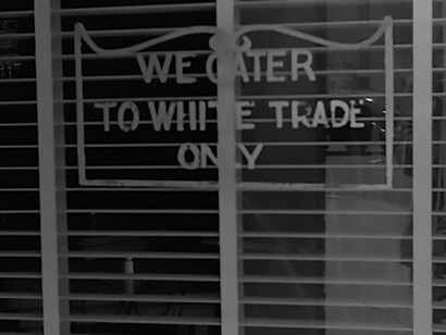 Sign on a restaurant: "We Cater to White Trade only.", taken in Lancaster, Ohio, USA, 1938