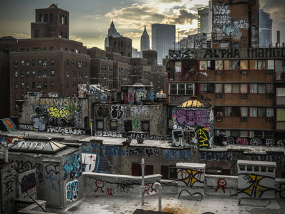 A vista of inner city buildings, abandoned and filled with graffiti