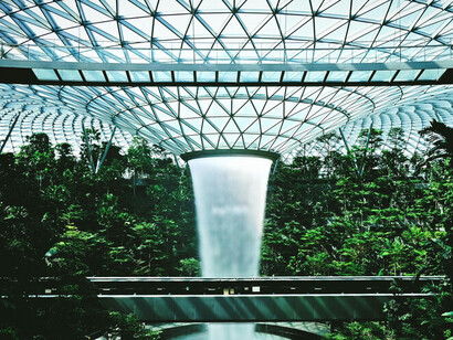 The glass dome and waterfall of Jewel Changi Airport, Changi, Singapore