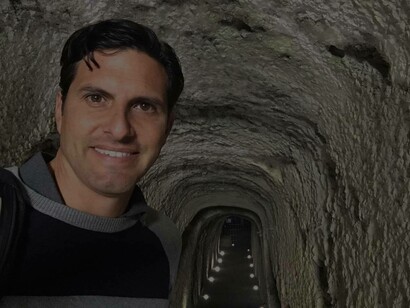 At the doorstep of the underground part of Rome, Italy with Darius Arya